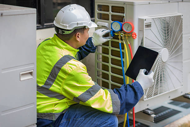 Professional Hvac technician working in White Hall, WV